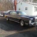 Solid as a rock 77 Continental Town Coupe needs freshening up.....