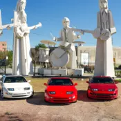 Three Nissan 300ZX, along with a parts car