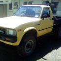 Toyota Hilux 1983 flat deck truck.