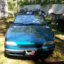 TWO MERCURY CAPRI CONVERTIBLES  1991 AND A 1993
