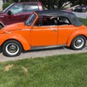Volkswagen Beetle, 1973, orange with black interior, convertible, restored
