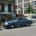 Volvo 240 sedan in rare blue, collectible car growing in value, very reliable