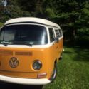 VW camper van 1972 orange and white, pullout bed and cot, sink and frig ,