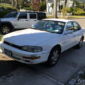 well maintained preowned in good condition white Toyota Camry