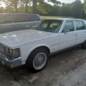 white 1978 cadillac seville with 68,000 miles.  It has a 350 gasoline engine