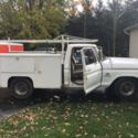 White Ford F-250 w/ Rack and Utility boxes. Fair condition,Runs great,New clutch