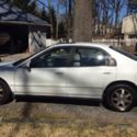 White, used, sunroof, low mileage, runs great.