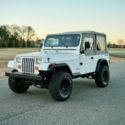 YJ / ONLY 54K ORIGINAL MILES / FULL SERVICE RECORDS / 5 SPEED / LIFTED / CLEAN
